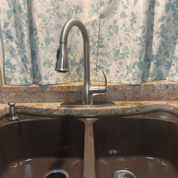 Modern stainless steel kitchen faucet and double sink installation
